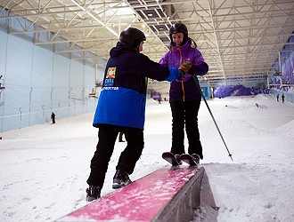 Skier riding a box