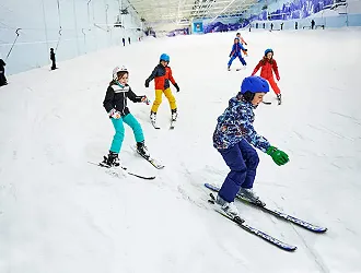 Children skiing on the main slope at Chill Factor<sup>e</sup>